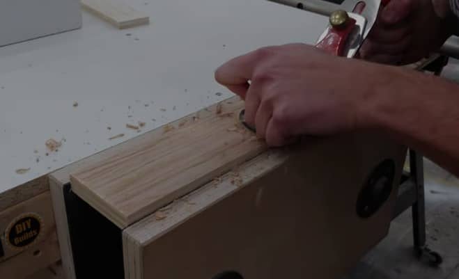 planning plywood with hand planer