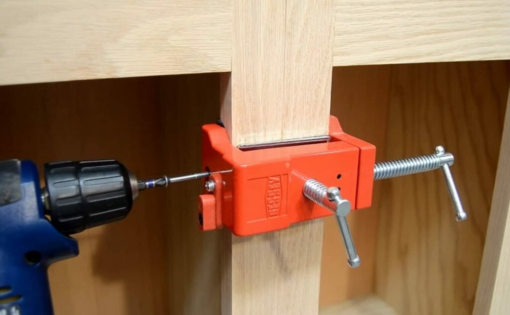 screwing into cabinet face frame clamp